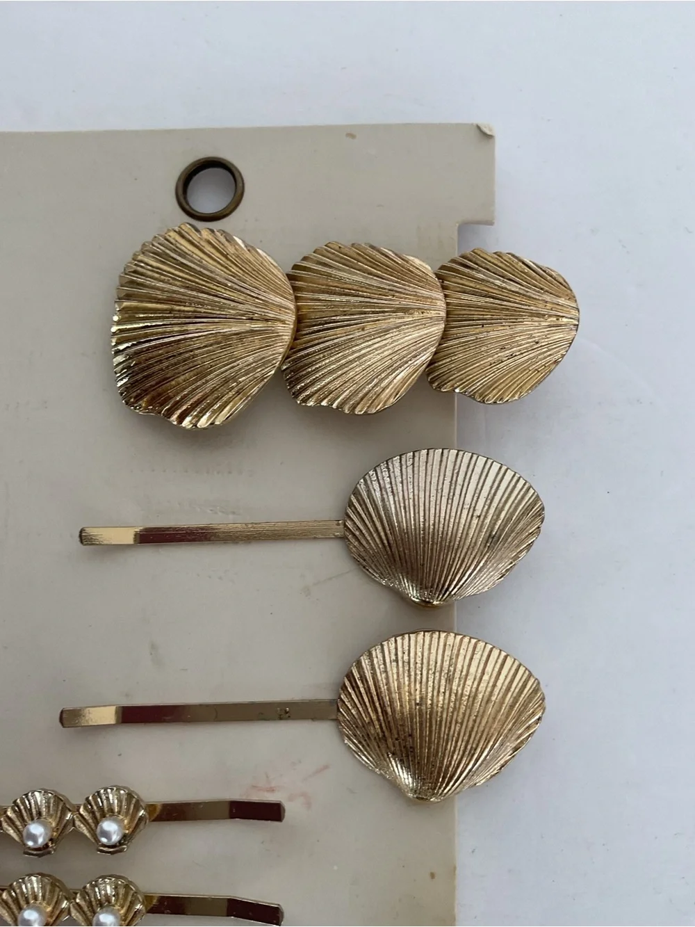 Anthropologie Gold she’ll hair clips NWT